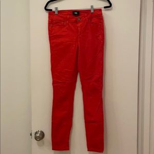 Paige red skinny jeans.
